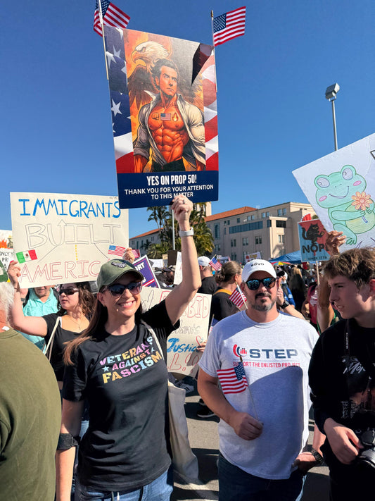 Strong confident goddess wearing Veterans Against Fascism tee during No Kings 2.0